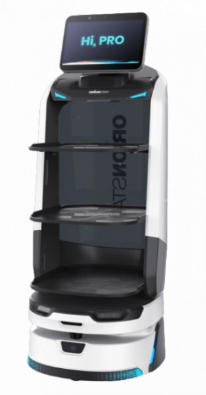 Ein weiß-schwarzer Service-Roboter mit Regalen und einem Bildschirm mit der Aufschrift "Hi, PRO" an der Oberseite, der den neuesten Stand der modernen Robotik präsentiert.