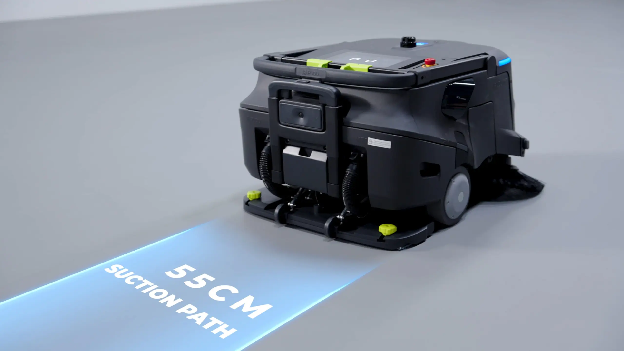 Der PUDU MT1 ist ein schwarzer Bodenreinigungsroboter mit einer 55 cm langen Saugbahn, die auf dem Boden blau markiert ist.